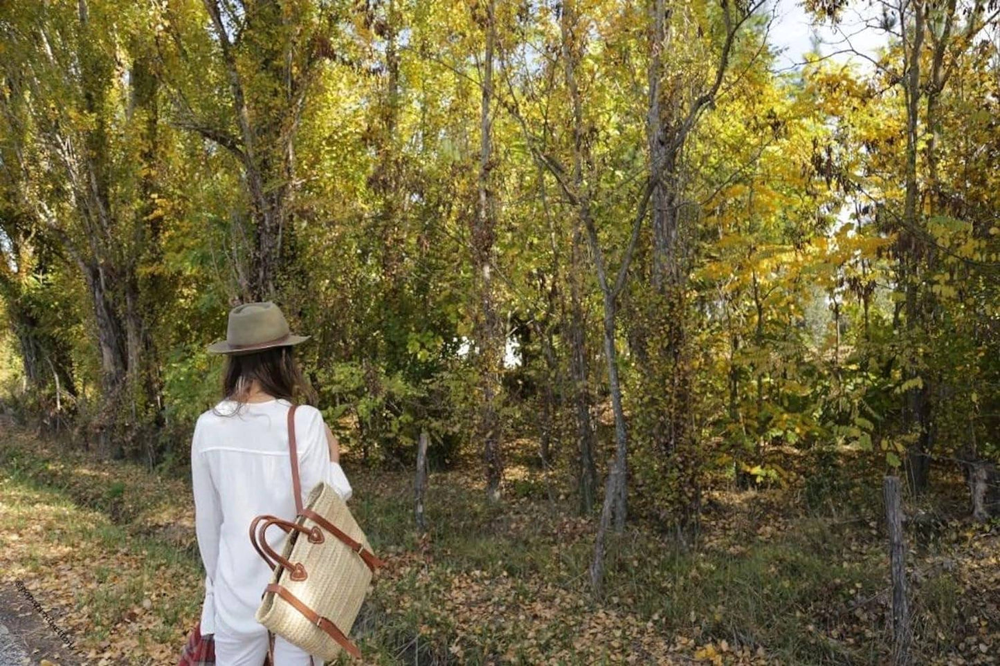 French basket backpack with leather strap