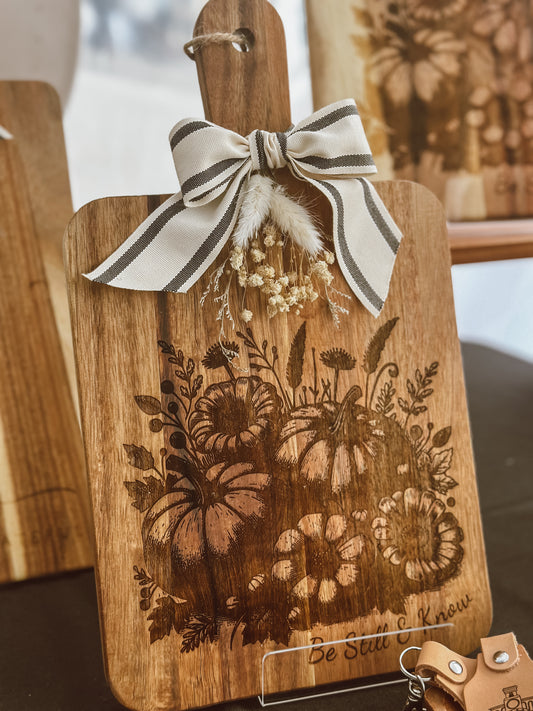 Be Still & Know Fall Pumpkins Cutting board